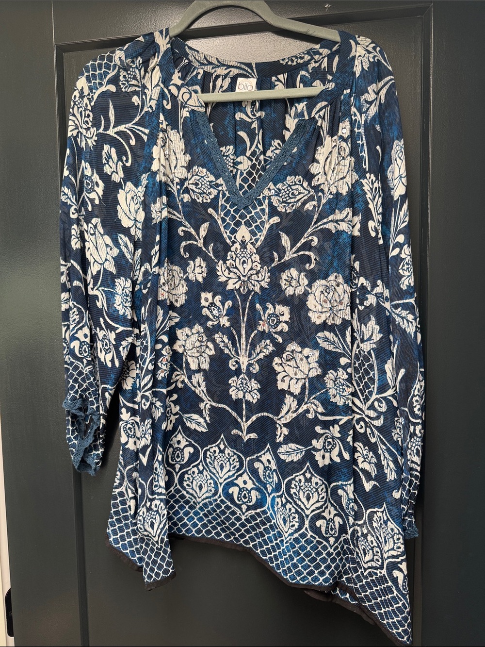 Sheer blue and white top with sparkles